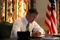 COOK Paul at the desk