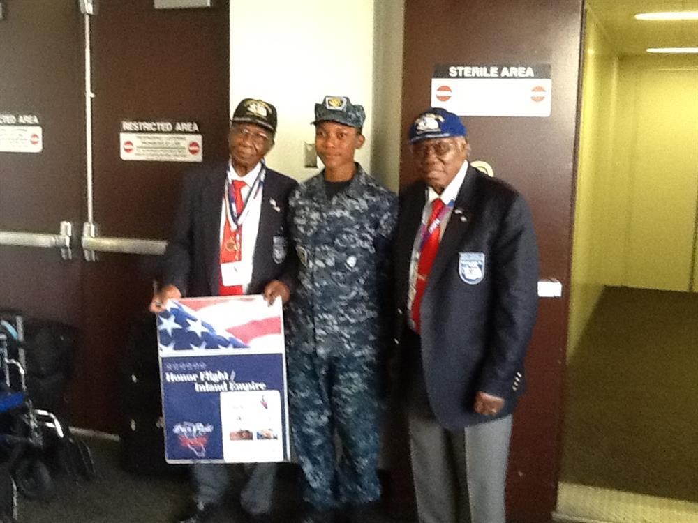 Tuskegee Airmen with Navy Sea Cadet[1]