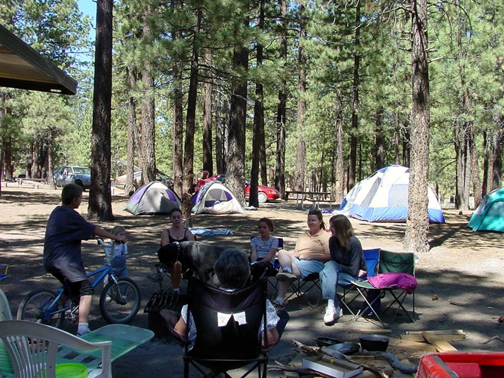 Camping family enjoying their time together
