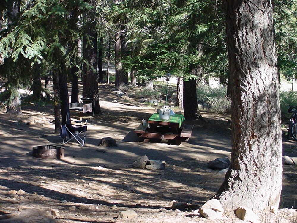 Picnic table set up at campsite
