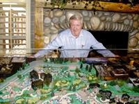 Mayor Jahn studies the model for the new Zoo